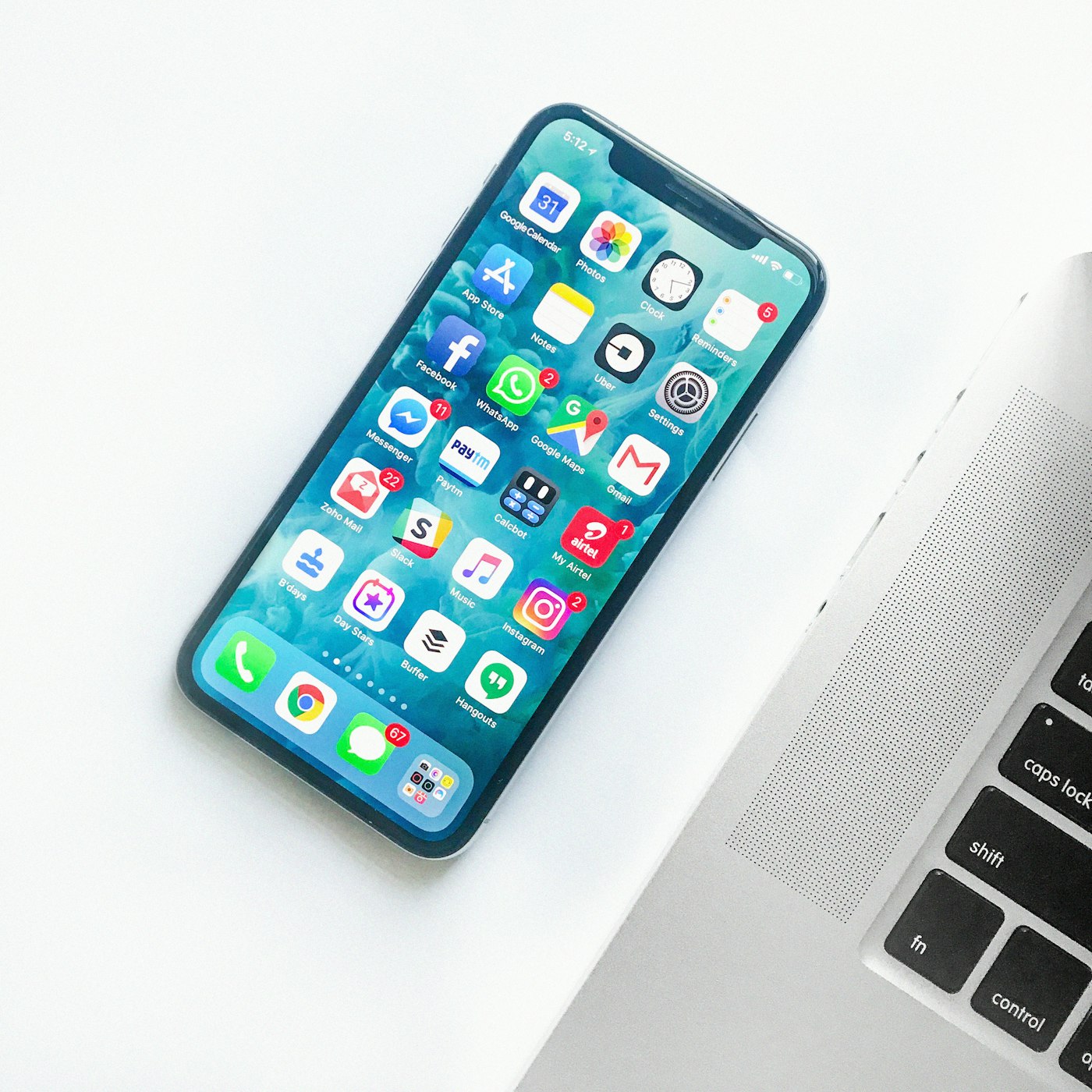 iPhone on a desk representing photo formats and sharing