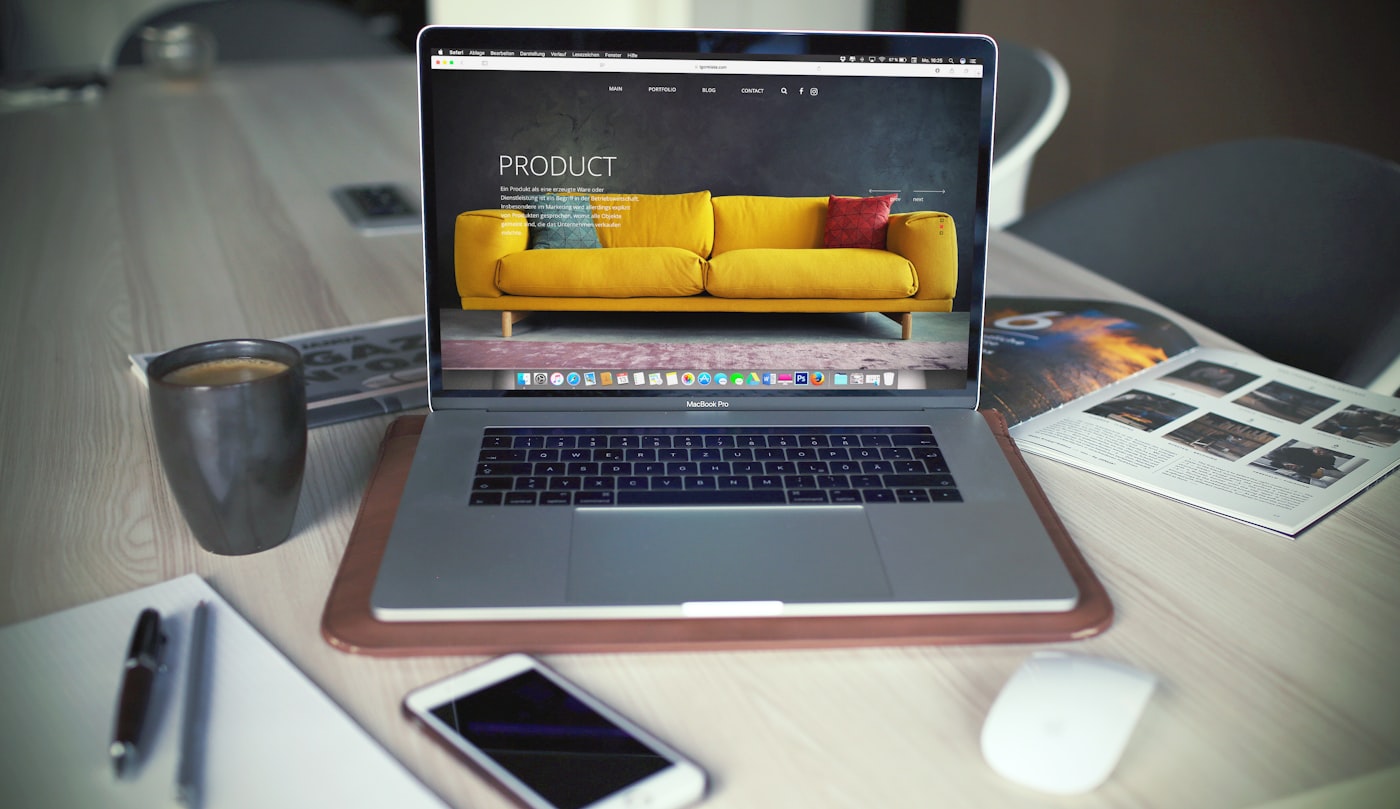 Laptop with photo-sharing workflow on screen
